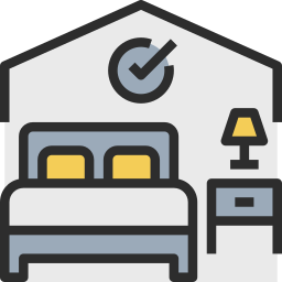 Icon of a comfortable bed with a lamp highlighting modern room features in Naakef accommodations.