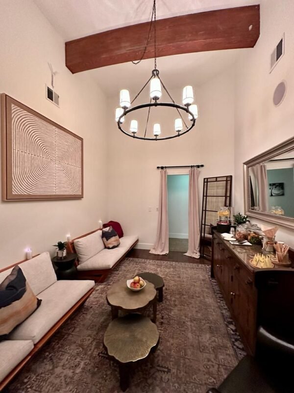 Serene spa relaxation room at The Spa at Sagecliffe Residences by Naakef with calm beige tones, modern furnishings, and peaceful ambiance for wellness retreats.